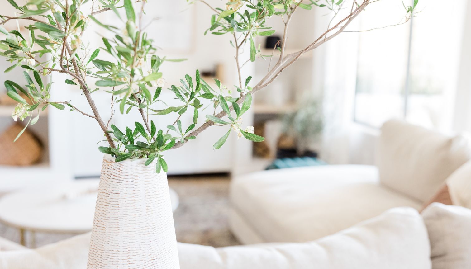 What is the impact of natural light on the overall ambiance of a home?